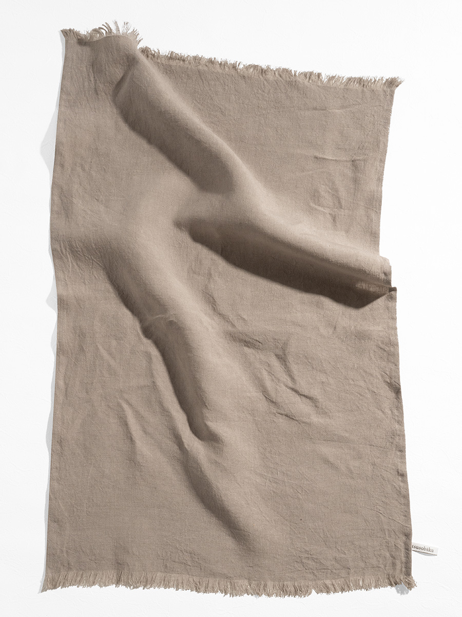 フリンジの付いたキッチンタオル